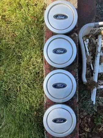 4 FORD OEM CENTER CAPS