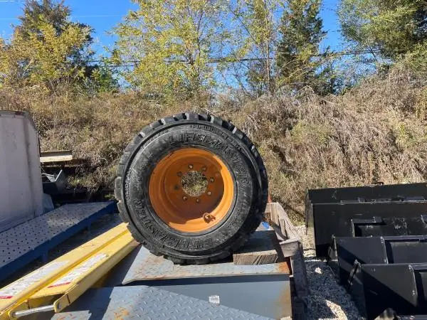 Case skid steer wheel