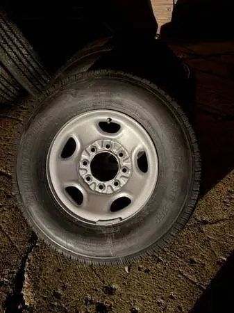 (4) Bridgestone Deuler 245/75/16 Tires on Chevy Express 8 Lug Wheels