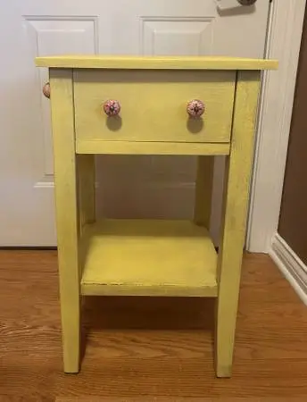 Cute wooden side table with drawer