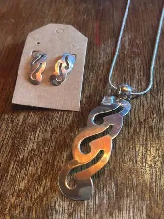 Sterling silver necklace with pendant and matching earrings