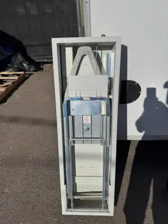 Iron away wall system ironing board