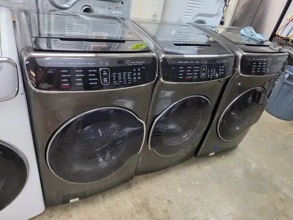 Samsung jumbo 6.0 cu ft Steam washer and gas dryer