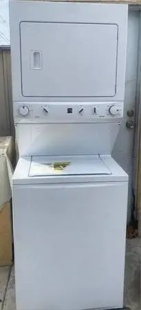 Like new Kenmore 27 white stackable washer and gas dryer
