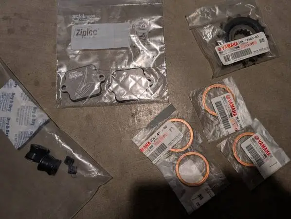 NEW OEM yamaha R1 SPROCKET, exhaust seals, GRAVES AIS PLATES