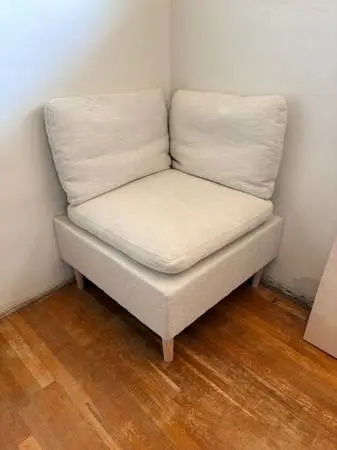 NEW corner chair with feather filled pillows