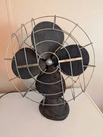 Antique metal fan