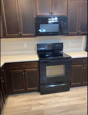 Fridge Stove, dishwasher, and microwave