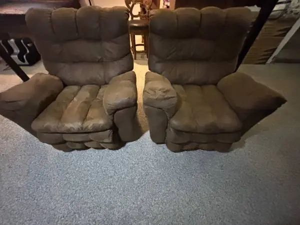 Two brown reclining chairs