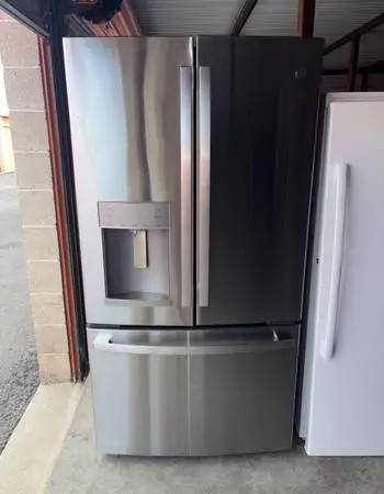 GE Stainless Steel Refrigerator And Freezer