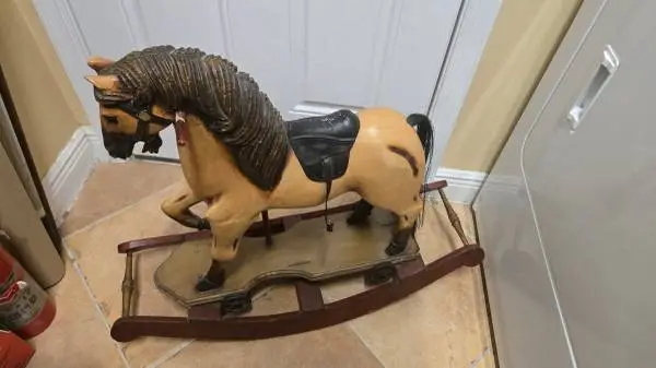 Wooden Rocking Horse. Vintage! Wood with cast wheels