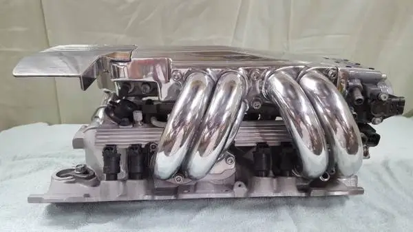 TUNED PORT INJECTION