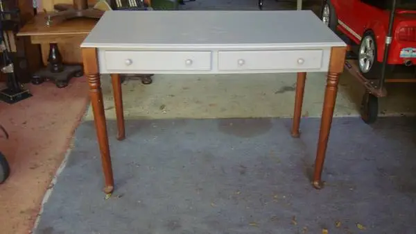2 drawer table great shape 23 by 43 inches leg come off