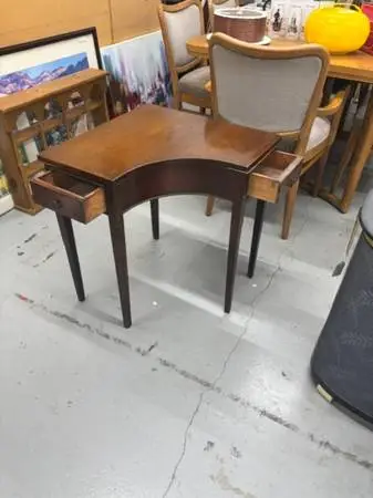 small brown wooden desk with 2 drawers