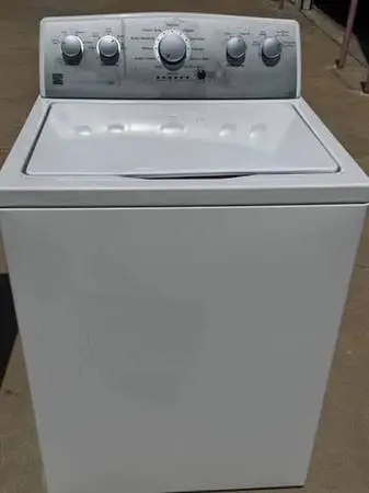 Kenmore washer top loader large load capacity with agitator.