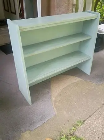 Light blue solid wooden bookcase