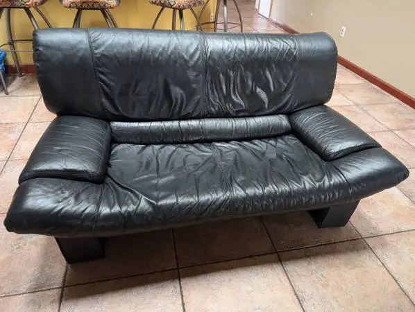 Black Natuzzi Leather Love Seat