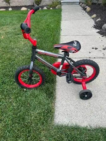 12 HUFFY BIKE WITH TRAINING WHEELS  $25