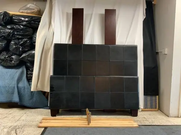 Black leather queen, size bed