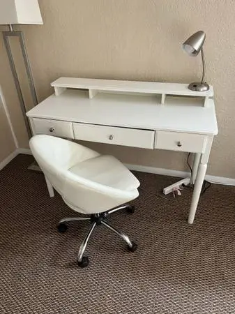 Desk and chair on rollers