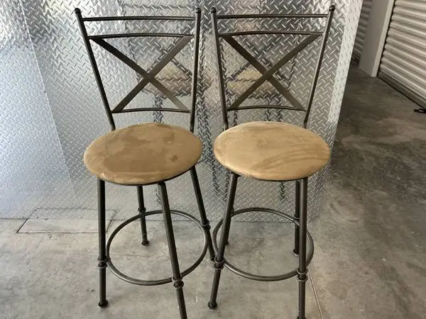 3 brown suede bar stools