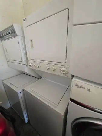 Kenmore 27 white stackable washer and gas dryer
