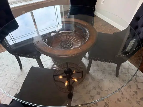 DINING TABLE - GLASS TOP - ORNATE WOOD PEDESTAL