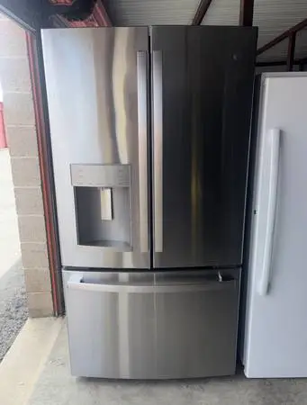 GE Stainless Steel Refrigerator And Freezer