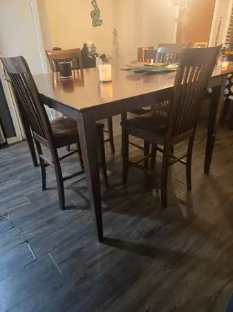 Heavy wood table with 4 chairs