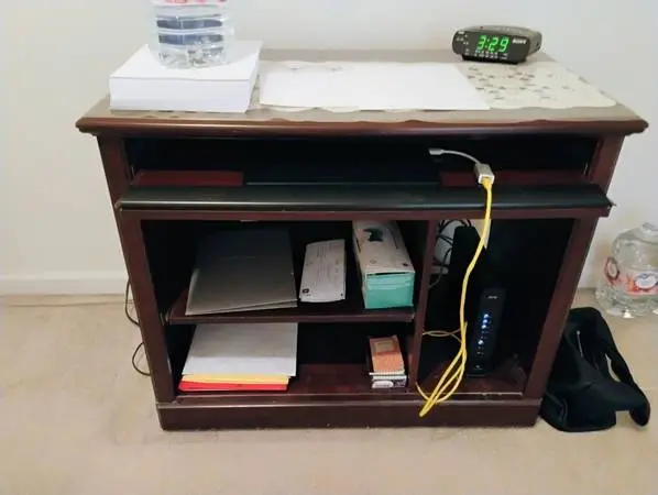 Desk with slide shelf