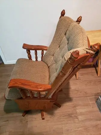 Swivel rocking chair.