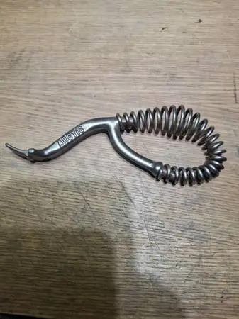 Woodstove lid lifter