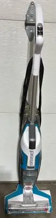 BISSEL MULTI SURFACE BRUSH VACCUM W/LIQUID CLEANING SOLUTION DISPENSER
