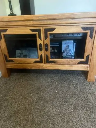 Tv stand glass front.