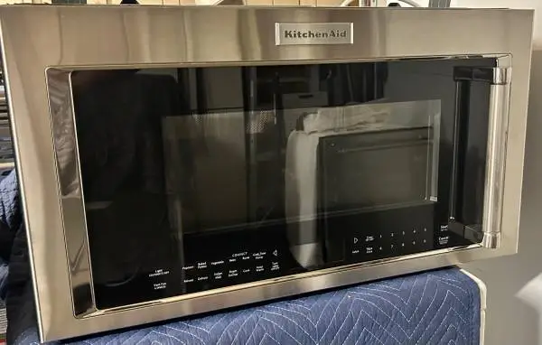 Used Kitchen Aid Over the range microwave/ hood 30” Width