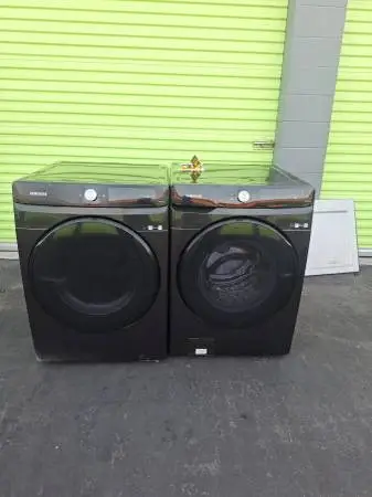 Samsung black bespoke smart front load washer and gas dryer