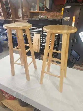 2 STOOLS NATURAL SOLID WOOD VERY GOOD CONDITION YOU GET BOTH FOR $15 (