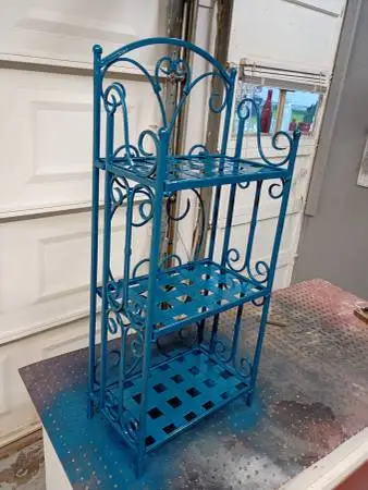 Vintage folding metal shelf just painted