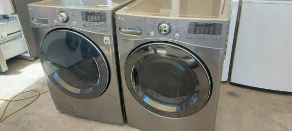 LG Steam Front Load Washer And Gas Dryer