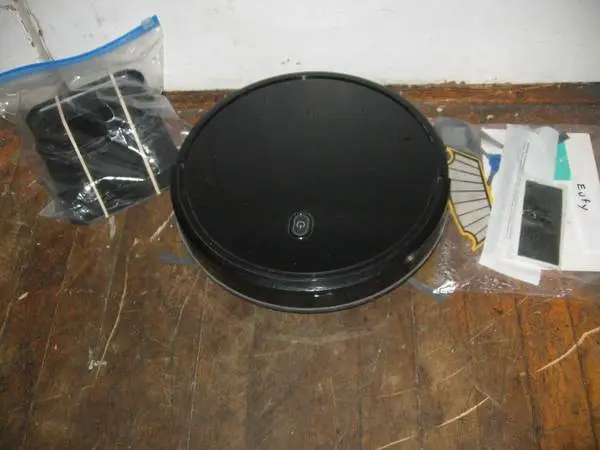EUFY VACUUM (Like A Roomba) W/Cradle Charger & Remote