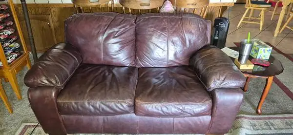 Leather sofa and bar stools