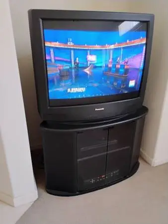 TV stand with TV and accessories