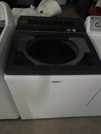 Whirlpool top load washing machine.