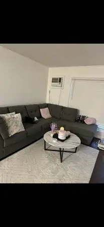 Living Spaces Gray Sectional Sofa - Modern, Spacious, Comfortable