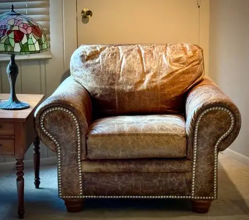 Oversized distressed leather club chair