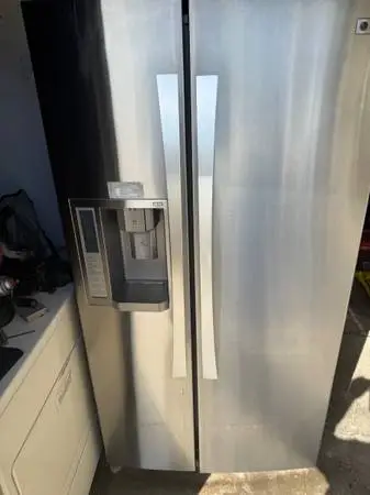 Lg stainless steel side-by-side refrigerator Free delivery