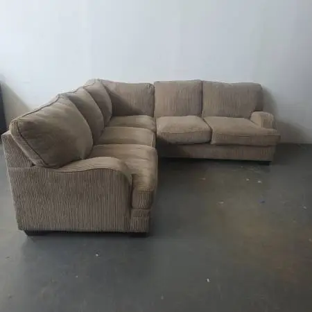 Ashley Furniture Brown Sectional Sofa - Comfortable and Spacious