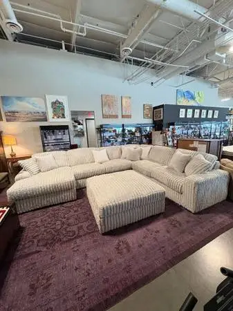Stupendous Alloy Sectional W/ Ottoman By Ashley Furniture