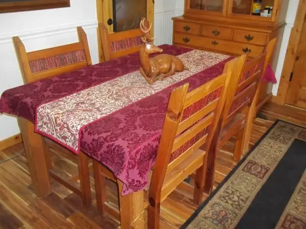 South western dining table and 4 matching chairs
