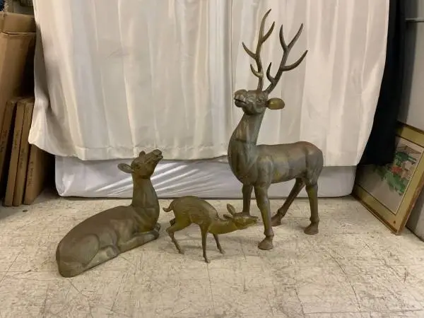 Set of three brass deer